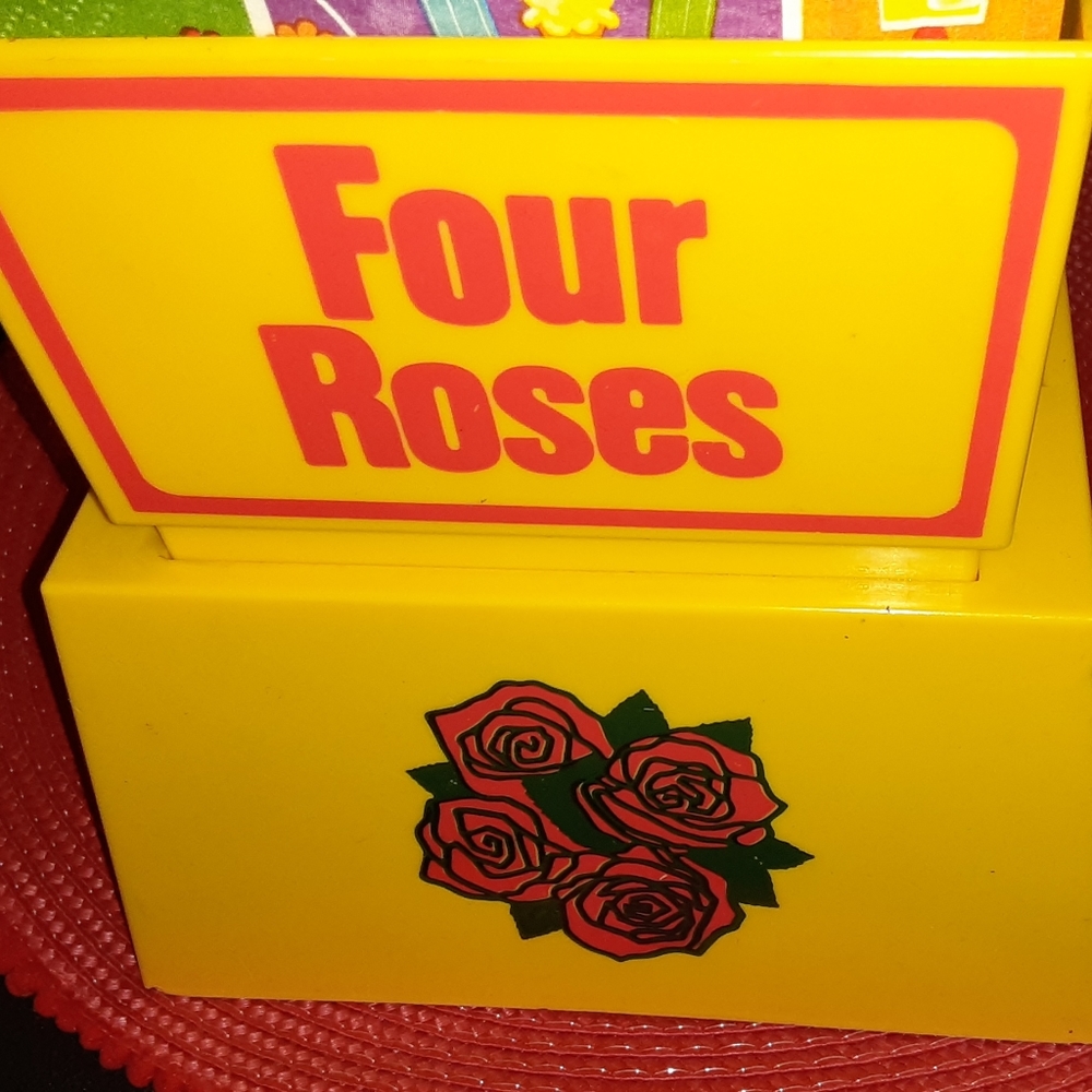 Vintage Four Roses cocktail napkin holder and shot glasses.